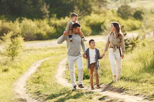 Family playing in a field together